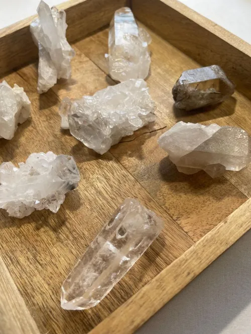 Amethyst and clear quartz combined with metals and woods in various designs