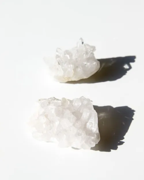 Close-up texture comparison between selenite and clear quartz