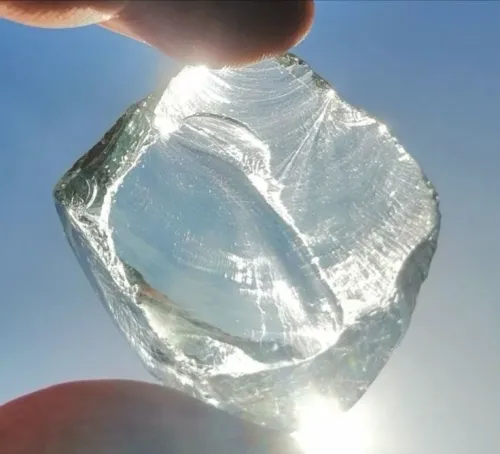 Quartz crystals resting safely inside woven basket beside bed